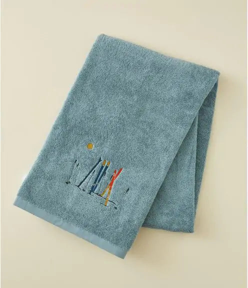 Cotton bath linen with embroidered fish